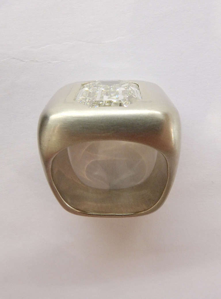 White gold Dinh Van ring set with a 5, 36 carat long emerald cut diamond. For Sale 1