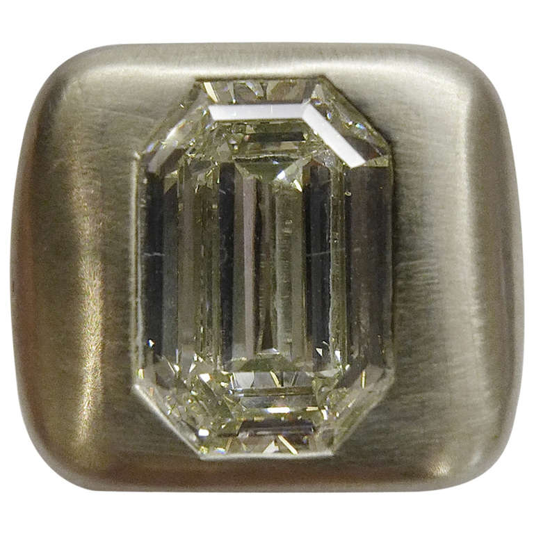White gold Dinh Van ring set with a 5, 36 carat long emerald cut diamond. For Sale