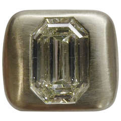 White gold Dinh Van ring set with a 5, 36 carat long emerald cut diamond.