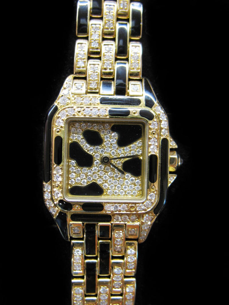 Contemporary Cartier Lady's Yellow Gold Diamond Black Enamel Panther Quartz Wristwatch