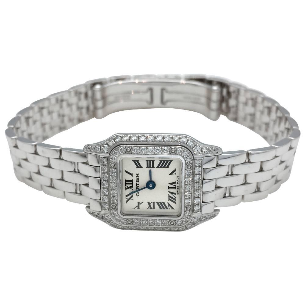 A 750/000 white gold Cartier watch, "Mini Panthère" collection. The bezel is set with two diamonds rows, white dial, roman numerals.
Quartz movement.
Length: 17 mm
Width 17 mm

