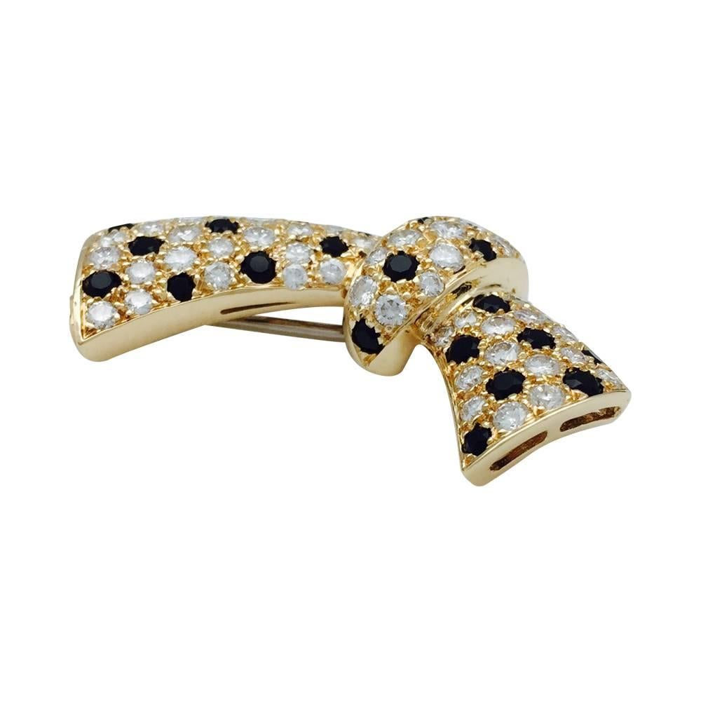 Yellow Gold Van Cleef & Arpels Knot Brooch, Diamonds and Onyx In Excellent Condition In Paris, IDF