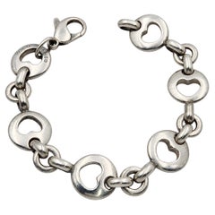 Tiffany & Co. Silbernes Armband mit Herz-Gliedern und Schablonenmuster, 6 Zoll, Unisex