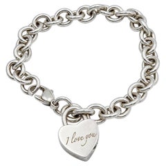 Tiffany & Co. Bracelet en argent sterling avec breloque en forme de cœur " I Love You " et lien Rolo 7".