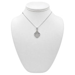 18k White Gold Heart Pendant with Diamonds and 17" Necklace.