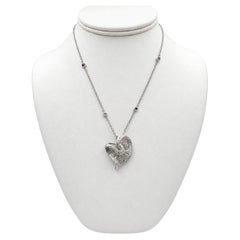 18k White Gold Heart Pendant with Diamonds and 15" Necklace.