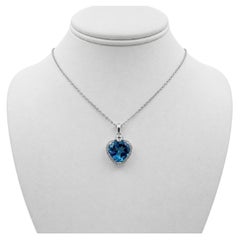 14k White Gold Heart Pendant with Blue Topaz and 16" Necklace.