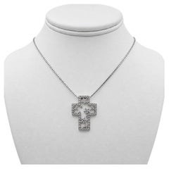 Platinum Cross Pendant with Diamonds and 16" Necklace.