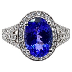 18K Weißgold Ring mit 5.00Ct. Tansanit und Diamanten 0,70 kt. (Größe 6,50)