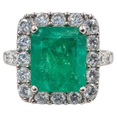 18k White Gold Ring with 4.63Ct. Emerald and Diamonds 1.91 Ct. (Size 6.25)