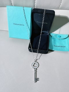 Tiffany & Co 18K White Gold Diamond Trefoil Clover Key Pendant Necklace