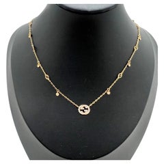 Collier ras-du-cou Gucci avec breloque « Interlocking G » en or 18 carats sertie de diamants