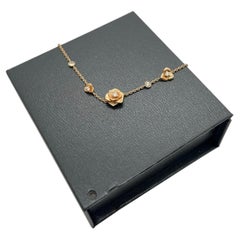 Bracciale Piaget Rose con catena a maglie fisse in oro rosa 18 carati con diamanti, motivo a fiori multipli