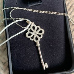 Tiffany & Co 18K White Gold Diamond Knot Key Pendant Necklace Au750