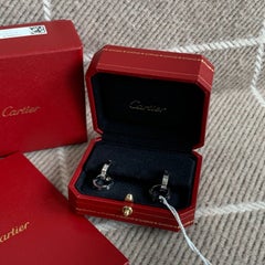 Pendientes de aro doble «LOVE» de Cartier, en oro blanco de 18 quilates con diamantes, de diseño multifuncional
