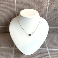 Collar con colgante de diamantes y malaquita de la colección Possession de Piaget, en oro de 18 quilates (Au750)