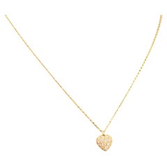 Collana con ciondolo a forma di cuore in oro 18 carati con pavé di diamanti di Cartier