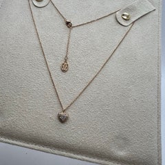 Collana con ciondolo a forma di cuore in oro 18 carati con pavé di diamanti di Cartier