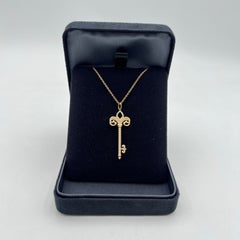 Tiffany & Co 18K Yellow Gold Fleur De Lis Key Diamond Pendant Necklace