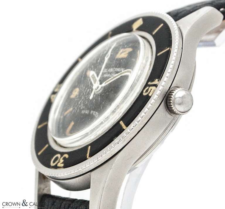 Brand: Blancpain
Series: Fifty Fathoms Aqua Lung
Case Back: 5585
Dial: Original aged black dial with radium markers and Arabic numerals at 3, 6, 9, 12 
Case Material: Brushed stainless steel
Diameter: 41.3 millimeters
Bezel: Original