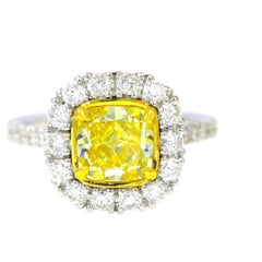 GIA Natural Fancy Yellow Diamond 3.22 CTW 18K White Gold Halo Engagement Ring