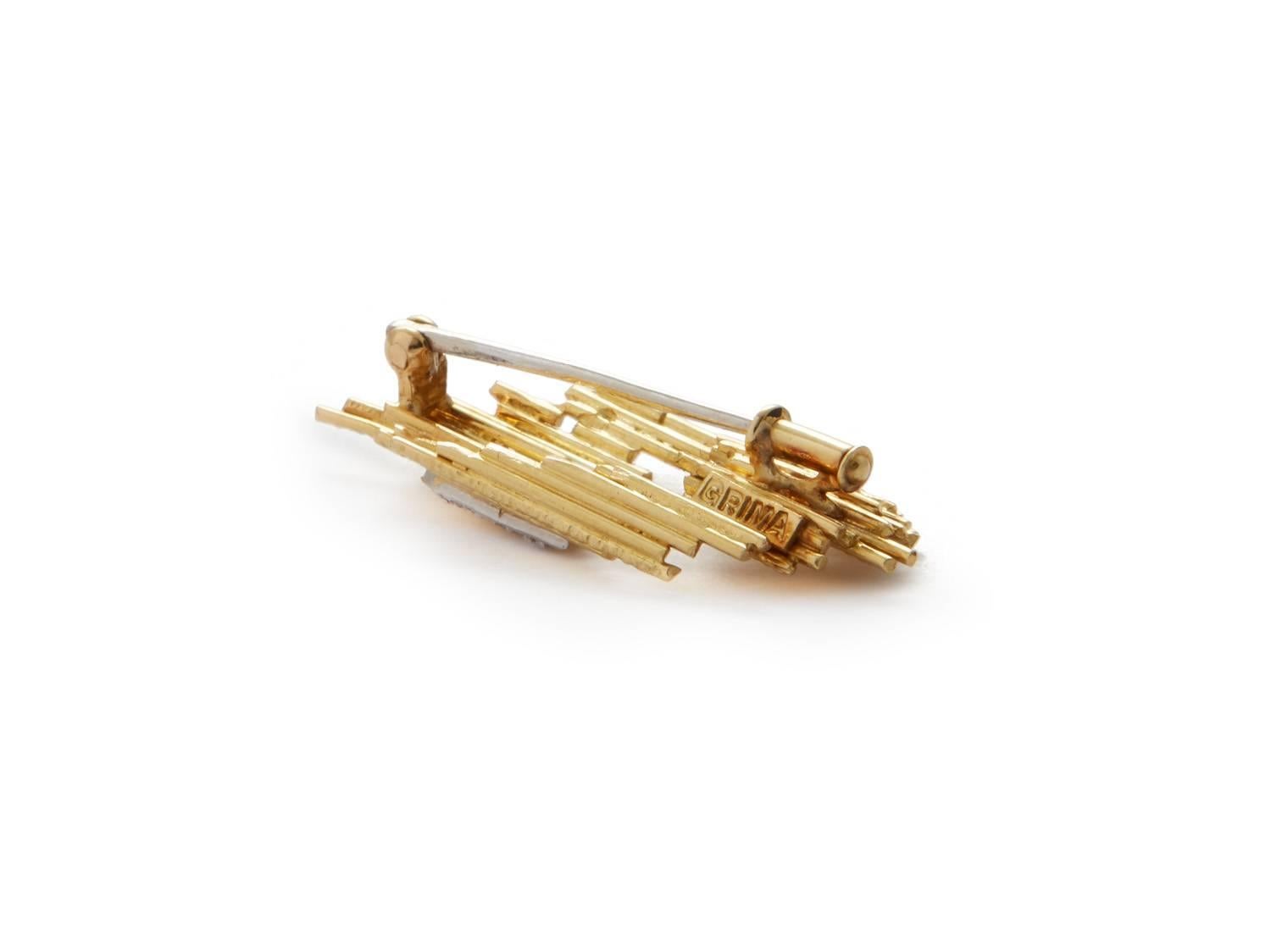 Andrew Grima, Untitled Brooch, Small, c. 1970, 'GRIMA' plaque on reverse, 18k textured gold with 3 diamonds and pin. 

Andrew Grima (1921-2007) was born in Rome and settled in England at the age of five. He trained as an engineer and entered the