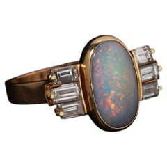 Anillo vintage australiano de ópalo macizo y diamantes de talla baguette, de oro de 18 quilates, de mediados de siglo