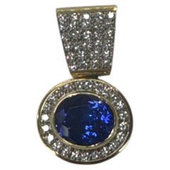 18k gold pendant with natural tanzanite and natural diamonds