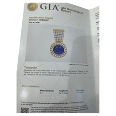 18k gold pendant with natural tanzanite and natural diamonds