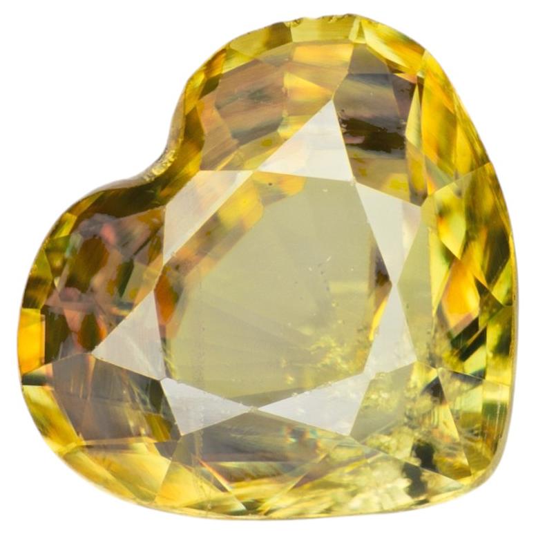 0.92 ct, Faceted vivid yellow sphene