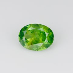 0.98 ct, Certified Russian faceted vivid apple green oval demantoid garnet