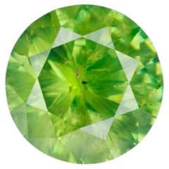 0,56 ct, facettierter russischer Demantoid-Granat mit Byssolit-Einschlüssen