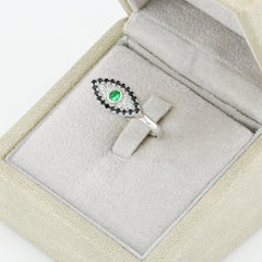 Faceted tsavorite evil eye silver ring