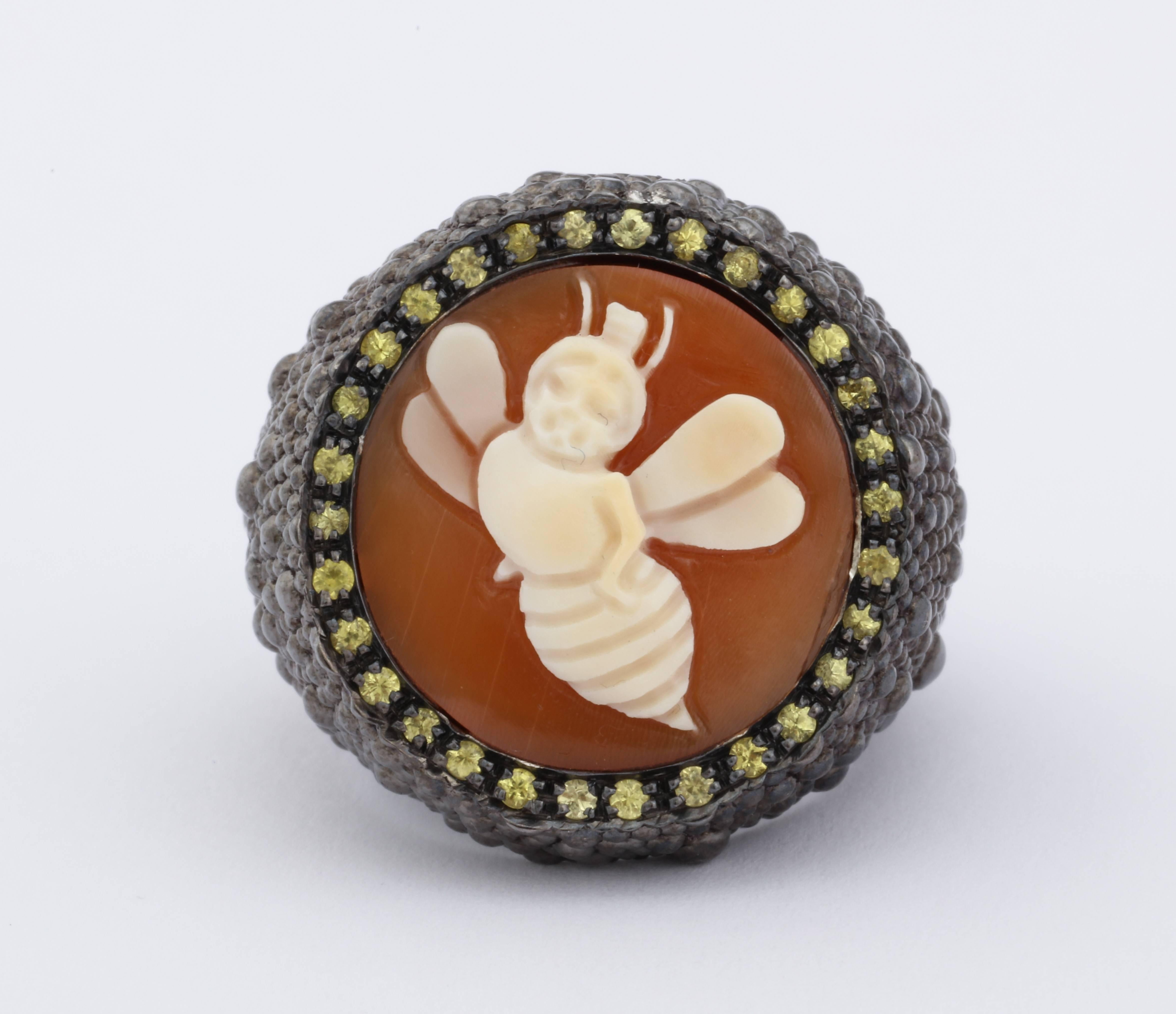 18mm cornelian shell cameo hand-carved, set in sterling silver black rhodium plated ring with yellow sapphires.