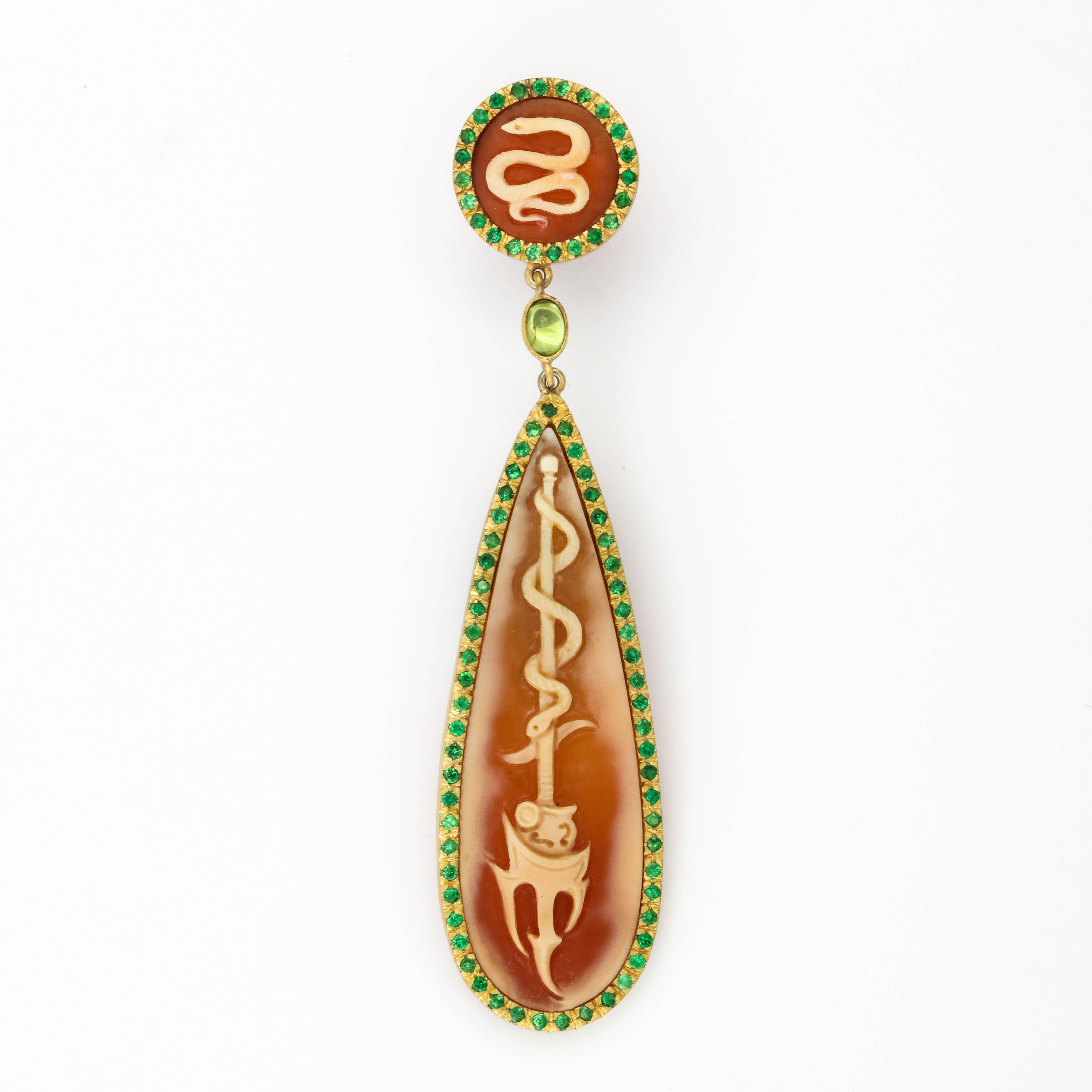 15mm/60mm carnelian cameos hand-carved, set in sterling silver rose rhodium plated, with peridots and tsavorites.