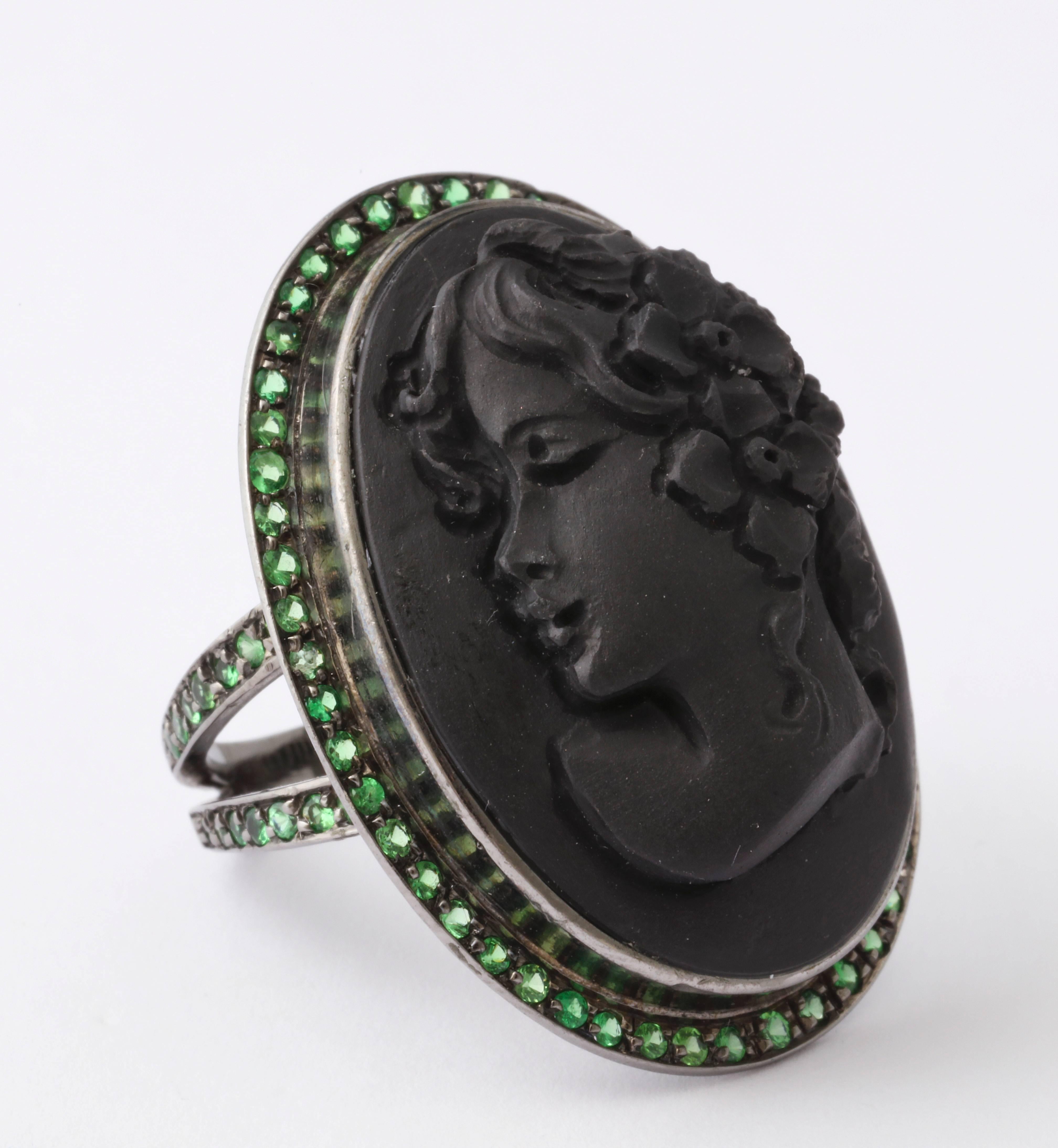 30mm black lava cameo hand-carved, set in sterling silver black rhodium plated  ring with tsavorite.