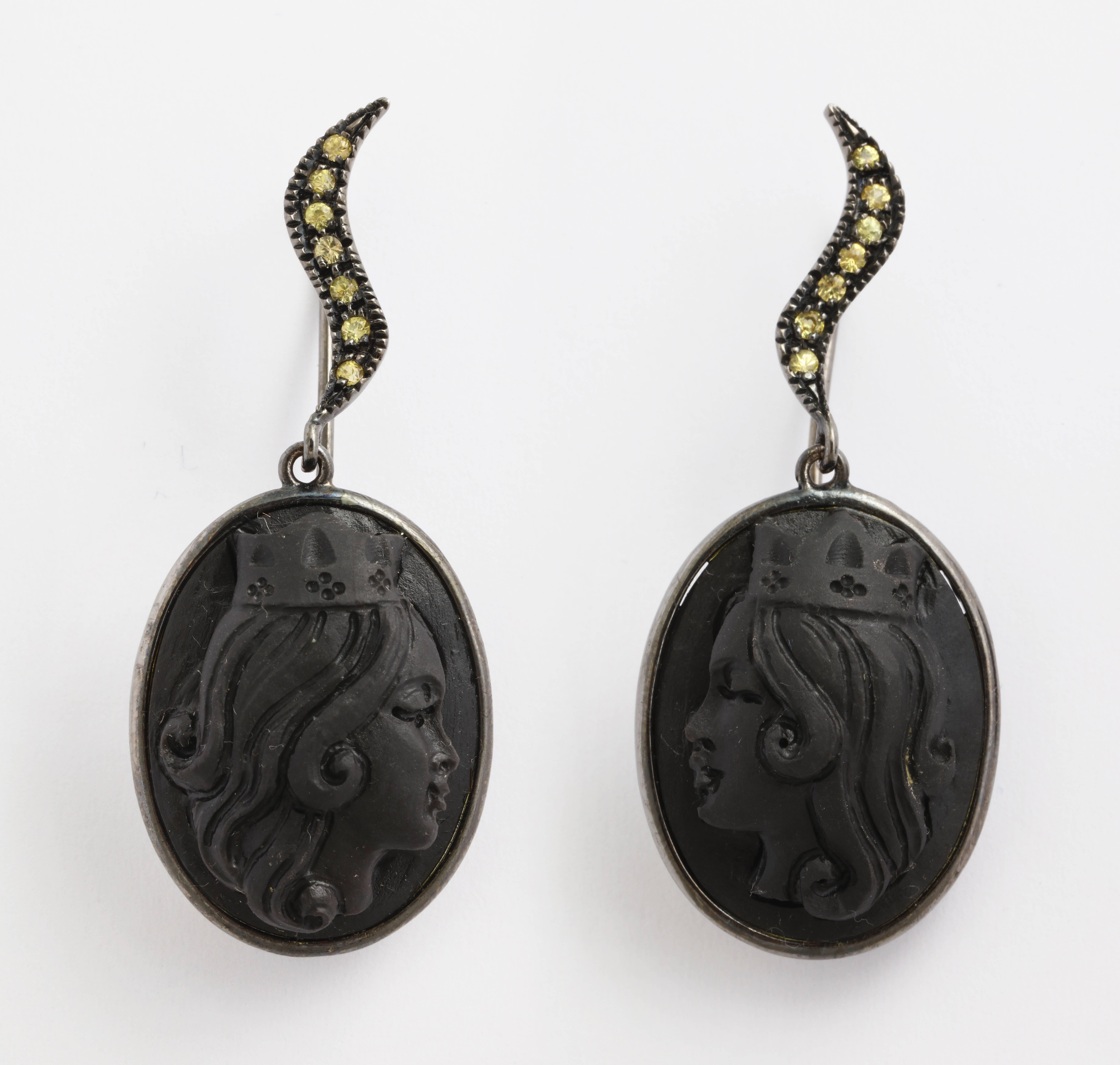 25mm black lava cameos hand-carved set in oxidized sterling silver earrings with yellow sapphires.