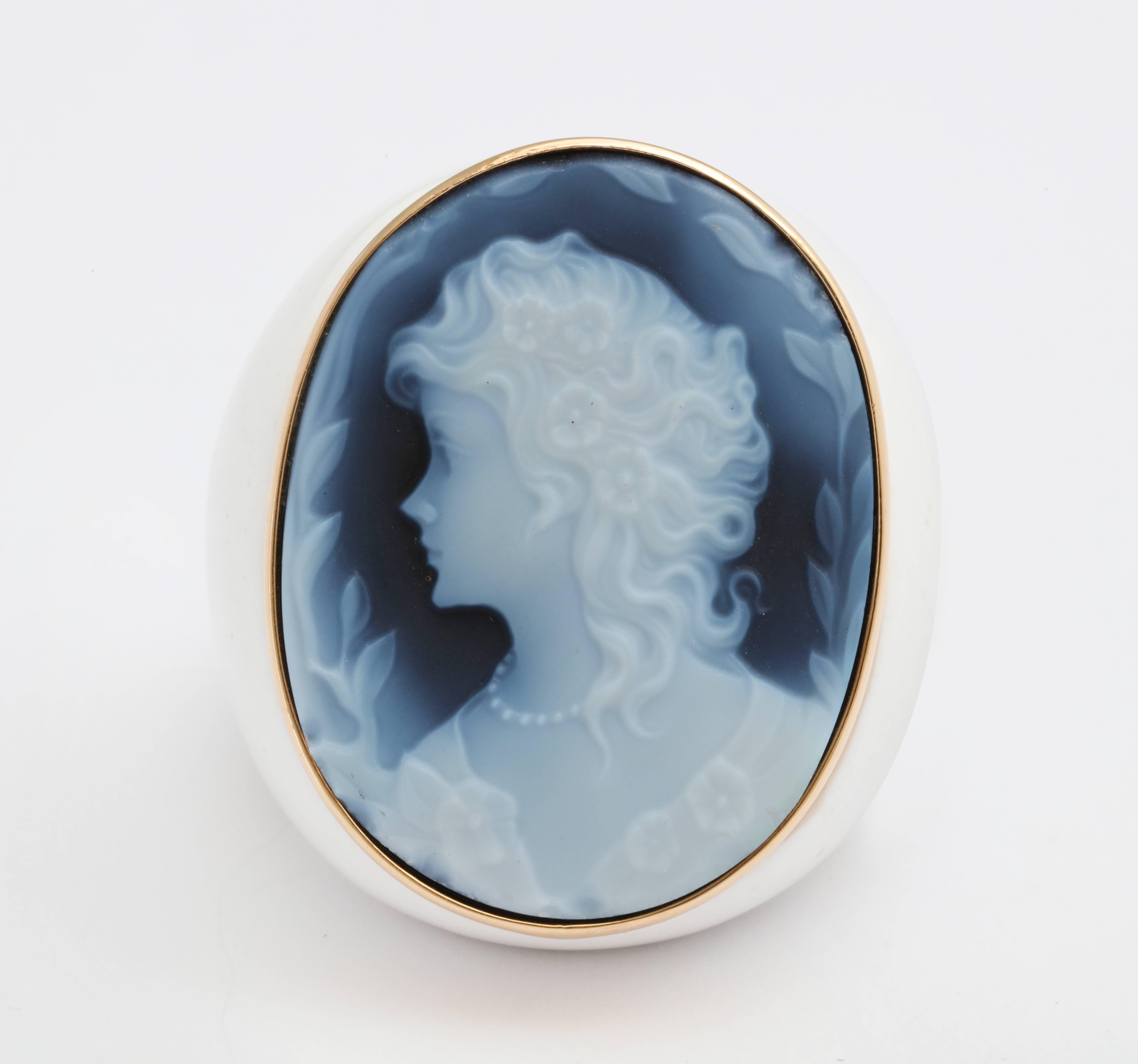 30mm blue agate cameo, hand-carved set in 14kt yellow gold on white agate base.
Ring Size: US 7 3/4
*Being these are hand crafted one of a kind designs, not all ring sizes might be immediately available. We offer custom sizing free of charge. 
Enter