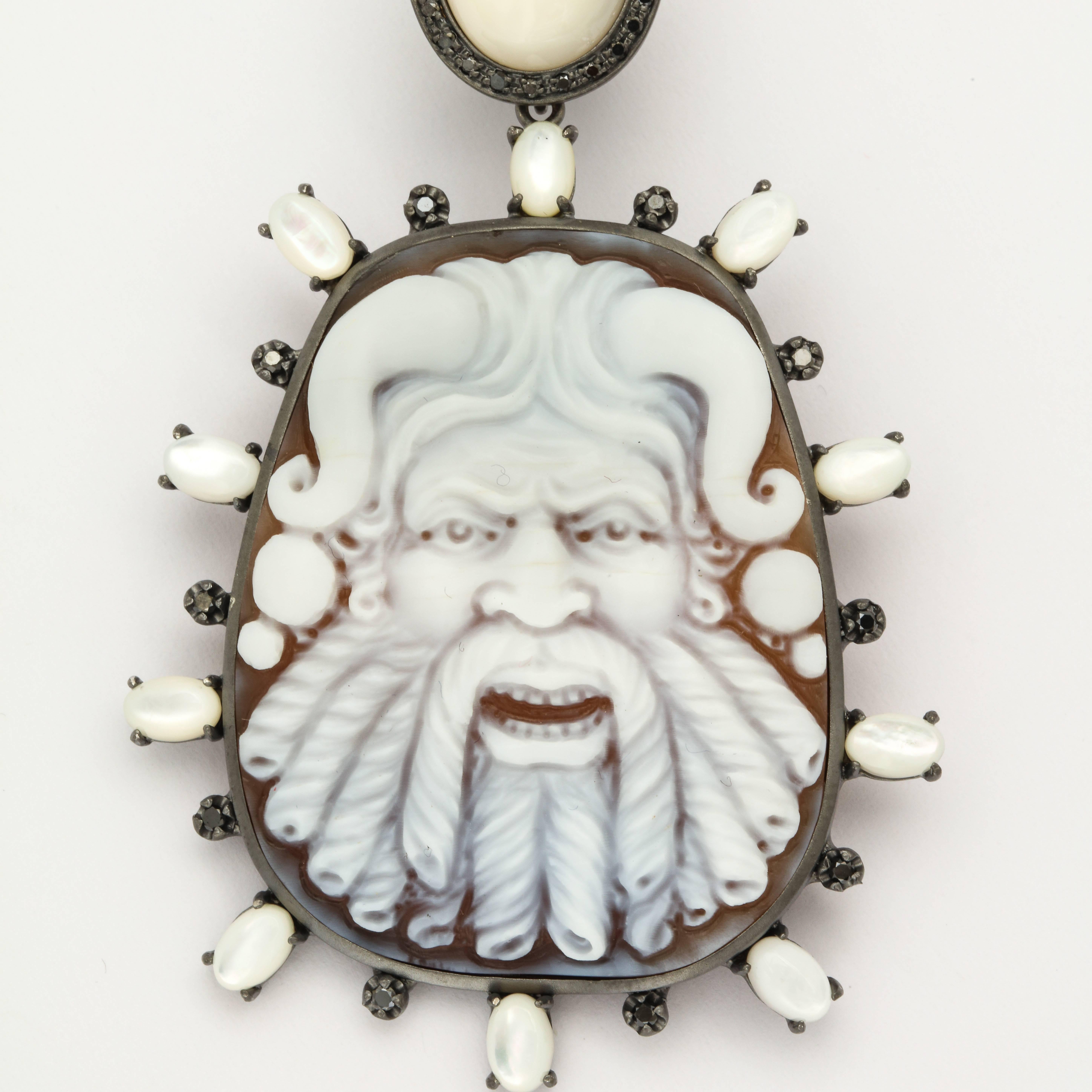 45mm sardonyx shell cameo hand-carved, set in sterling silver, black rhodium plated with 0.80ct black diamonds and mother-of-pearl stones.