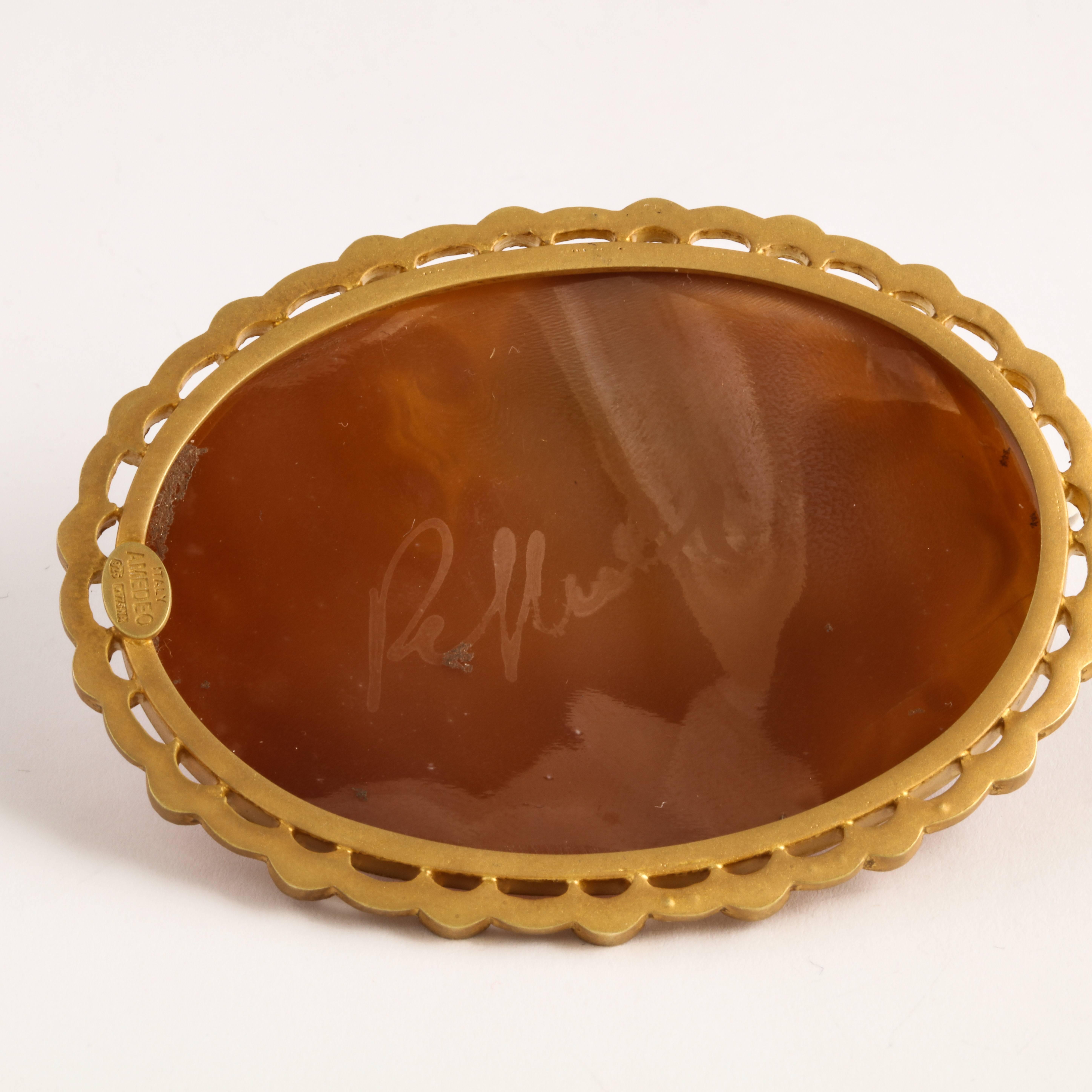 60mm sardonyx cameo shell, hand-carved set in sterling silver, gold plated with black diamonds.