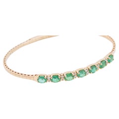 Pulsera rígida flexible con diamantes esmeralda de 3,64 quilates en oro amarillo de 14K