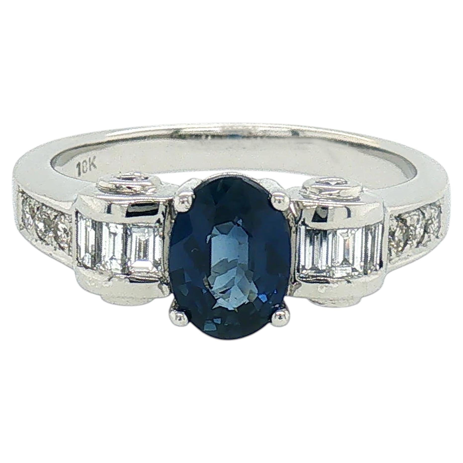 1.45 Carat Oval Blue Sapphire Baguette Diamond Cocktail Ring in 18K White Gold For Sale