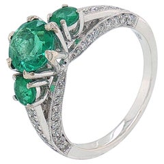 1.30 Carat Emeralds in Three-Stone Diamond Ring in 14K White Gold