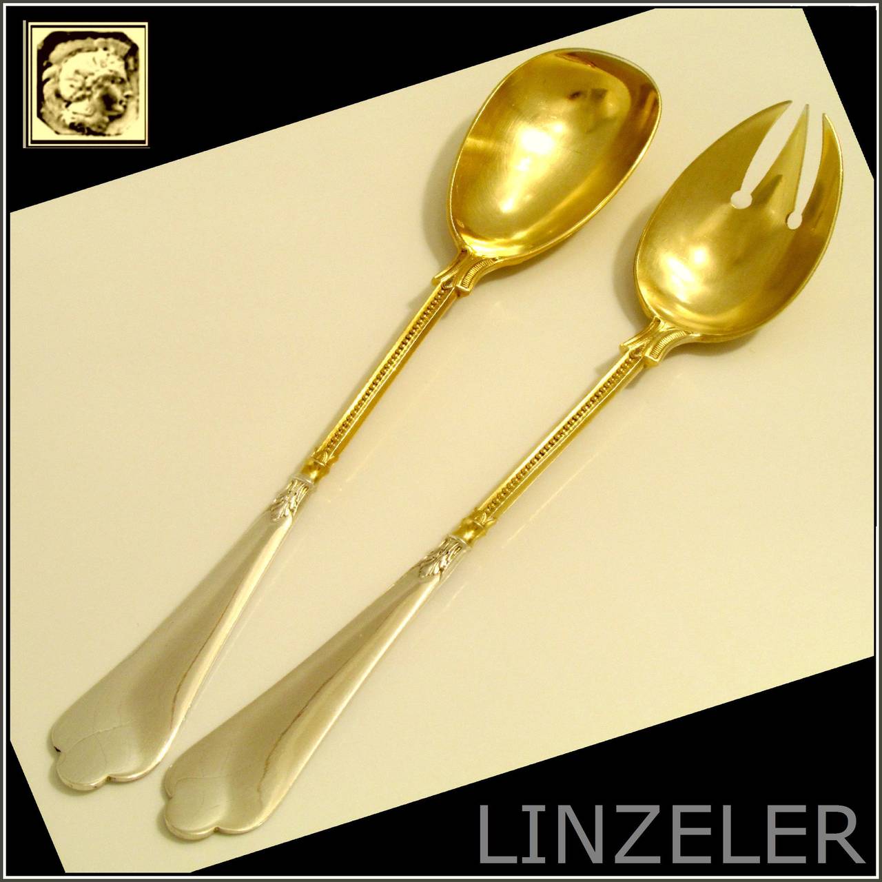 Linzeler Top French All Sterling Silver Vermeil Salad Serving Set 2 pc 

Head of Minerva 1 st titre for 950/1000 French Sterling Vermeil Silver guarantee.

This salad serving set is comprised of a three-tined fork and a spoon with the polylobed