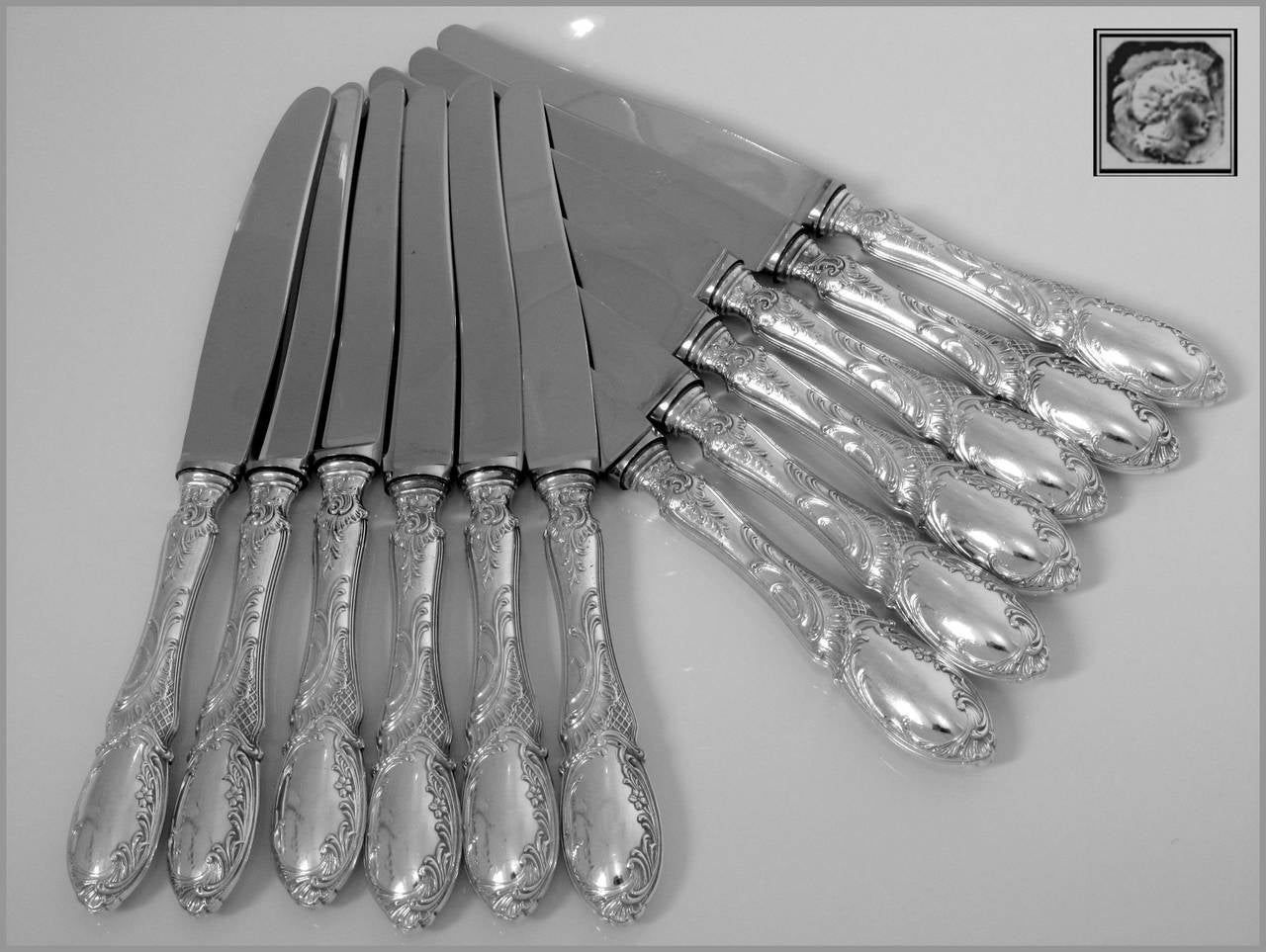 French Sterling Silver Dessert Knife Set 12 pc Rococo, Stainless Steel Blades

Head of Minerve 1 st titre on the handles for 950/1000 French Sterling Silver guarantee and Stainless Steel Blades engraved Nogent Inox.

The design and workmanship