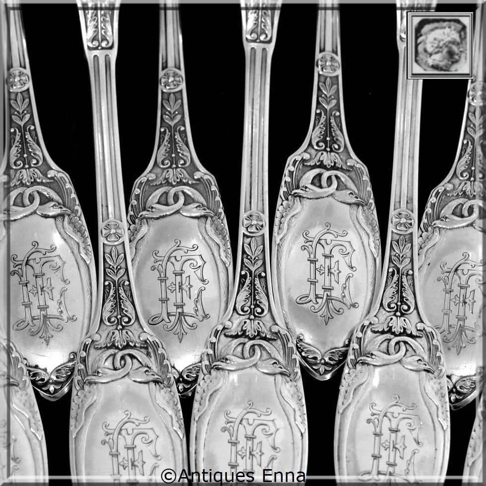 Combeau Rare French Sterling Silver Dinner Flatware Set 12 pc Swans

Exceptional French sterling silver Dinner Flatware 12 pc Empire style, the spatulas are carved on both sides of interlaced swans. Beautiful palmette and laurel decoration

Two