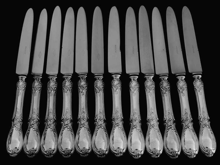 PUIFORCAT Rare French Sterling Silver Dessert Knife Set 12 pc Roses

A rare dessert knife set with fabulous Rococo decoration. Handles have a sophisticated foliage decoration. This model is called 