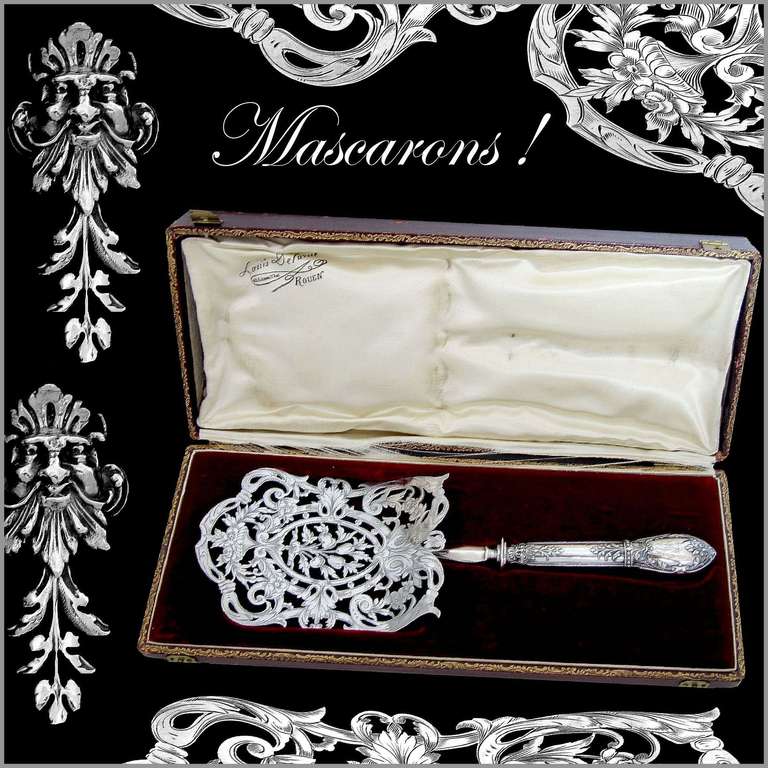 French Sterling Silver Asparagus/Pastry Server w/ original box Masks

The pierced curved blade has foliate engraved decoration on one side. Mascaron & foliages on the handle. Both the design and quality of workmanship are exceptional.

Head of