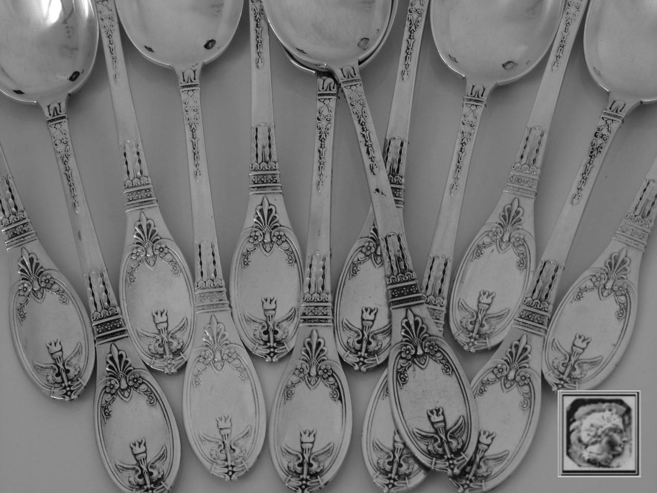 LAPPARRA French Sterling Silver Tea/Coffee Spoons Set 12 pc w/box Empire

A rare set with torches, swans wings, palmettes, laurel wreath and flowers decoration. This model is called 