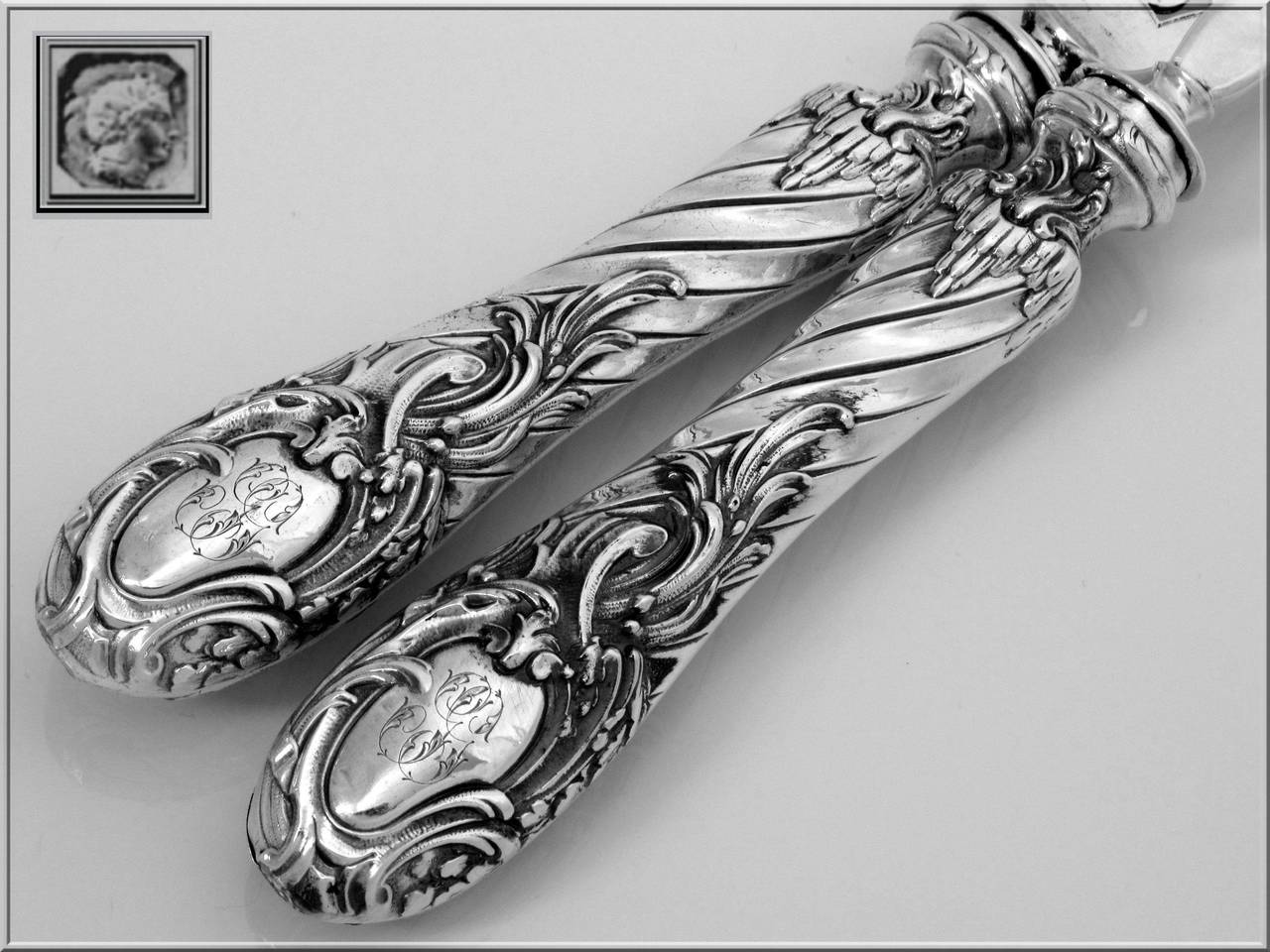 LEFEVRE Gorgeous French Sterling Silver Fish Servers 2 pc Rococo

Head of Minerve 1 st titre on the handles for guarantee 950/1000 French sterling silver. The upper part of the Fish Servers are silver plated.

Prestigious silversmiths :
Eugène